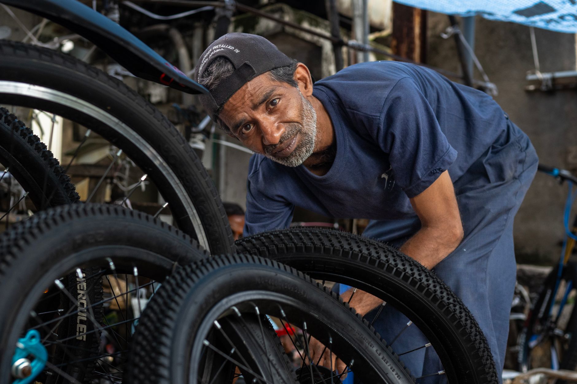 bike mechanics working together in workshop